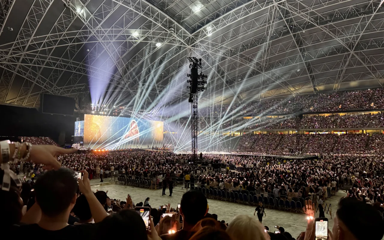 Taylor Swift performing on stage during The Eras Tour