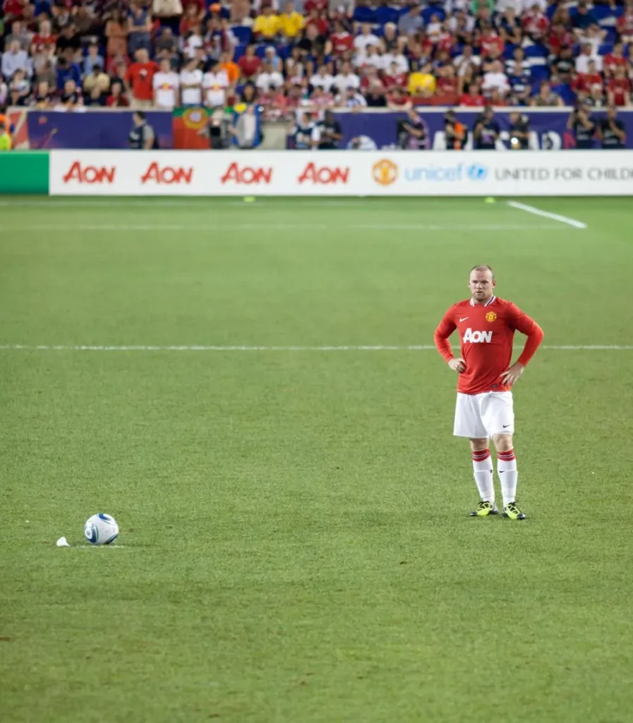 Wayne Rooney prepares a free kick for Manchester United against MLS All-Stars in July 2011