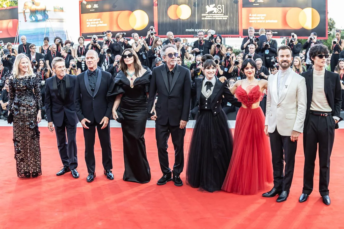 Winona Ryder, sixth from left, with the Beetlejuice Beetlejuice cast and crew at Venice in 2024