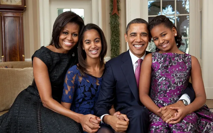 Barack and Michelle Obama with their daughters in an official 2011 family portrait