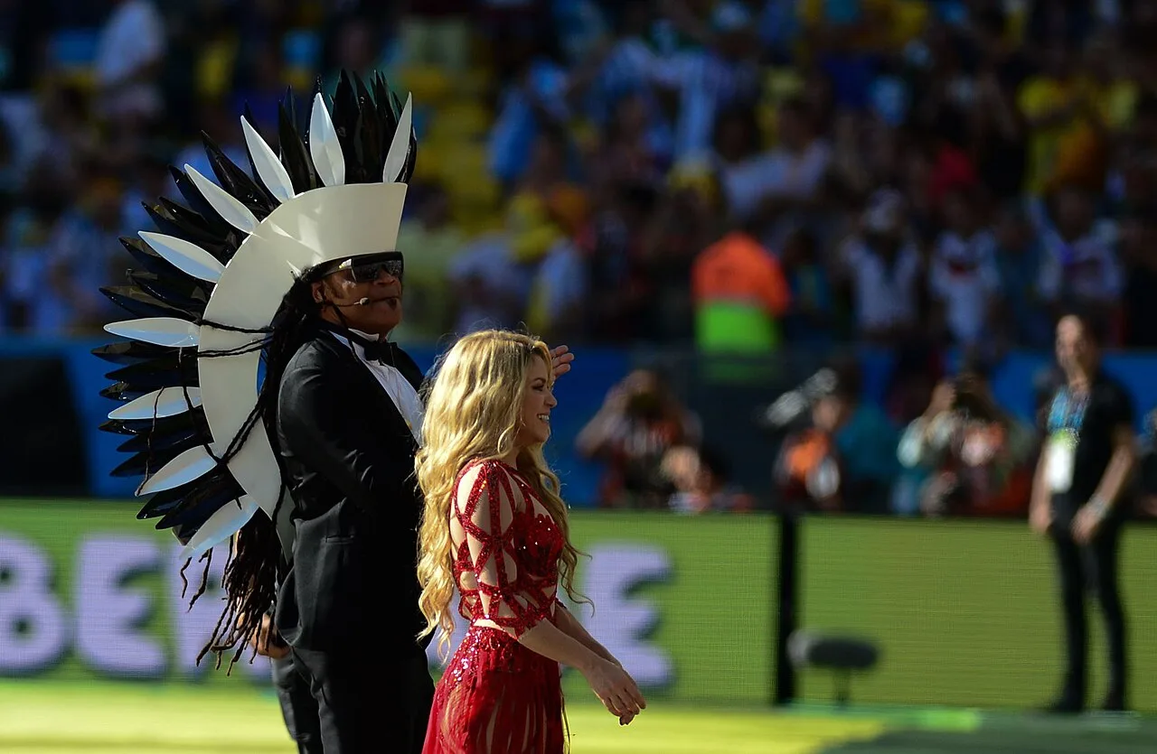Open the featured image for Shakira Net Worth: What Her Tour and Catalog Deals Really Show Shakira and Carlinhos Brown at the 2014 World Cup closing show