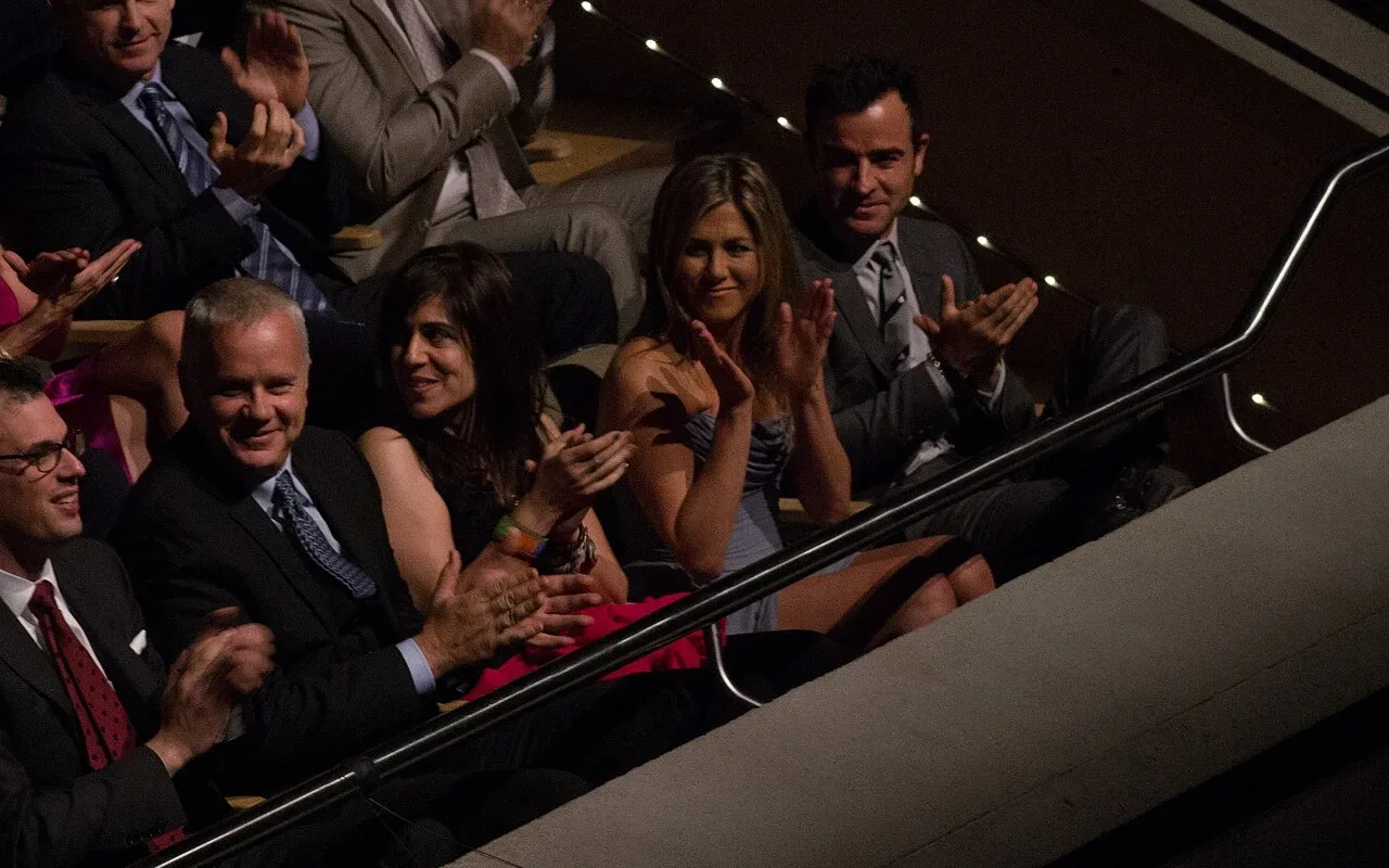 Tim Robbins and Jennifer Aniston at a Life of Crime festival appearance in 2013