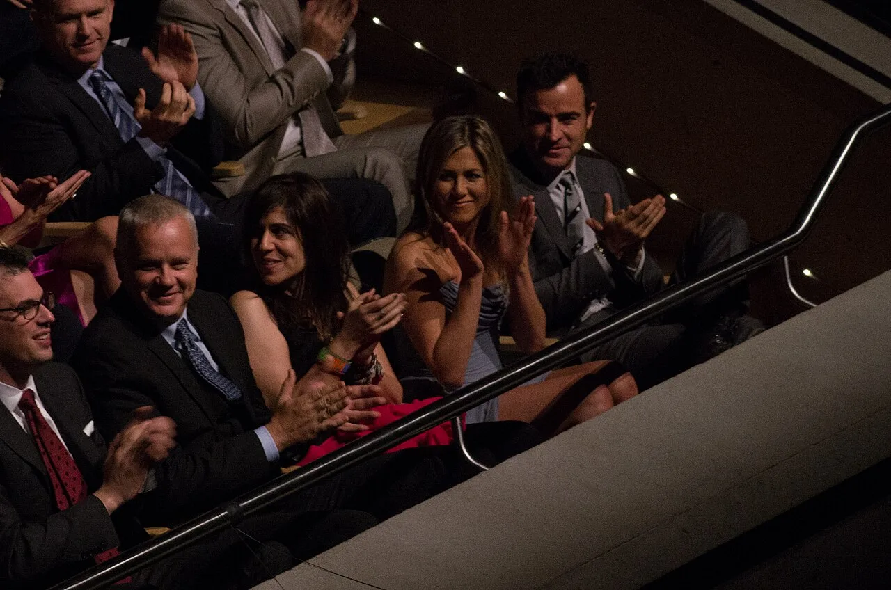 Tim Robbins and Jennifer Aniston at a Life of Crime festival appearance in 2013