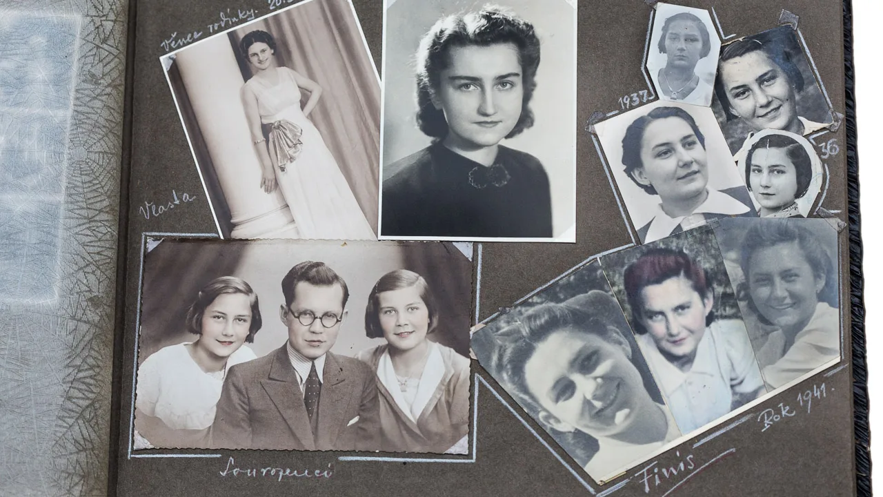 Open the featured image for Digital Photo Organization: A Safer Weekend Reset for Your Library An open historical family photograph album with handwritten captions